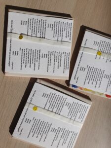 Children engaging in a fun and educational tile painting activity at a summer camp in a hotel