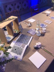 Corporate team participating in a hands-on Portuguese tile painting workshop in Lisbon