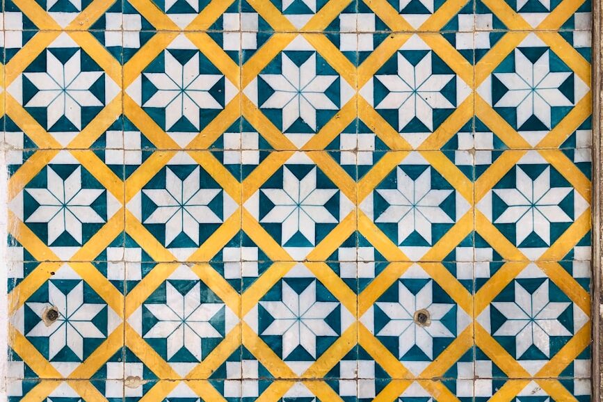 yellow and white floral textile